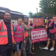 Striking Royal Mail workers at Darwen Delivery Office