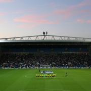 Fans and players observe a minute's silence at Ewood Park following the death of Queen Elizabeth II. Pic: PA