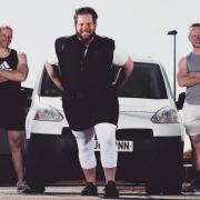 John Darwen and James Baker have broken their own world record for pulling a vehicle the furthest distance in 24 hours