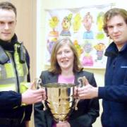 CUP TIE PCSO: John Pepper, head teacher Averil Culverhouse and  council officer Aled Thomas