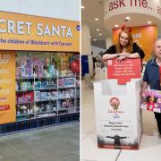 Carley McKenna from The Mall Blackburn with Phil Boulding from Secret Santa