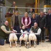 Members of the Leach family with their supreme champion prime lambs at Skipton Auction Mart’s annual Christmas show, joined by, standing from left, buyers George Cropper and Claire Mellin, of Croppers Family Butchers in Accrington, Claire Radley,