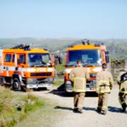 WORKING HARD Firefighters on moors in Bacup
