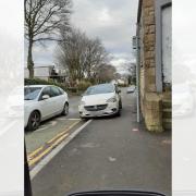 Ann Sutcliffe was unable to get past this car on her mobility scooter in Blackburn