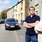 ANGER Alison Bradley with MP Jake Berry outside her home on Burnley Road East, Waterfoot