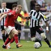 Nottingham Forest's Lewis O'Brien and Newcastle United's Allan Saint-Maximin battle for the ball