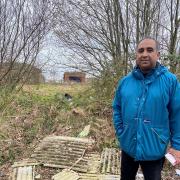 Jemshad Ahmed with fly-tipping in Church Ward