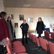 Penny Mordaunt (right) and Sara Britcliffe (centre) talks to staff at Veterans in Communities in Haslingden