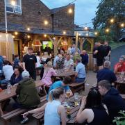 The beer garden is great for socialising at The Brown Cow