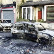 AFTERMATH  Burned out cars in Oxford Road, Burnley