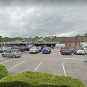 Police are appealing for information after money was stolen from Asda in Accrington