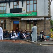 Worshippers at the Darussalam Education Centre  in Blackburn