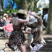 WELLY STEPS Hannah Sloan and Farrah Gill dancing in the woods