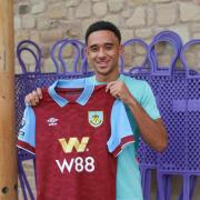 The midfielder has signed a five-year deal at Turf Moor
