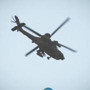 Apache AH-64 helicopter flying over Oswaldtwistle
