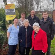 Haslingden Hall staff and residents join Rosso's team at the new bus stop in the care home's gardens. Pictured front row, from left: Sarah McCavana, team leader and residents Brenda Farnell and Eileen Smith, with back row, from left: Jo-Ann