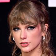 Taylor Swift, who could make history at the 2024 Grammy Awards as the first person to win album of the year four times.