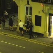 A fight between a man and woman outside the Union Street pub in 2022 (images via CCTV footage shown during Chorley Council licensing committee hearing)