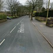 A road is closed on Helmshore Road in Haslingden