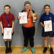 Girls’ top three centre, first place Evelyn from St Paul’s Constablee, left Lola from St James the Less, Rawtenstall and right third place Gianella from Waterfoot Primary School.