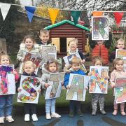 Children celebrate at Sparthfield Happy Day Nursery in Accrington