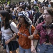 Demonstrators chant at a pro-Palestinian protest at the University of Texas . Protests on campuses have galvanised a whole generation of students.