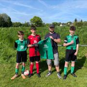 Pendle Forest Raptors players present Andrew Sunter (Marsden Building Society) with club shirt
