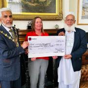 The outgoing Mayor of Blackburn with Darwen has presented £2,000 to the local hospice on behalf of a mosque.