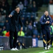 Portsmouth boss John Mousinho on the sidelines