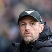 Oxford boss Gary Rowett looks on