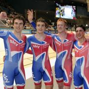 Geraint Thomas, Steven Burke, Ed Clancy and Peter Kennaugh celebrate team pursuit victory in Melbourne.