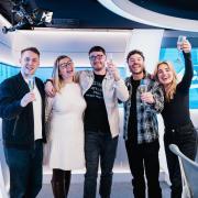 The now engaged Sophie and Darren with the Capital team