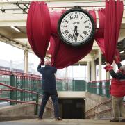 The unveiling of the restored Carnforth Station clock in Lancashire, which has been rehung following repairs