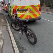 An electric bike was seized in Penwortham after one of the riders skidded off right in front of police