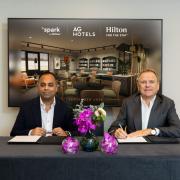 Girish Grover (founder and CEO, AG Hotels Group) and Simon Vincent (president, Europe, Middle East & Africa, Hilton)