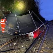A trampoline that flew onto rail tracks in a previous storm