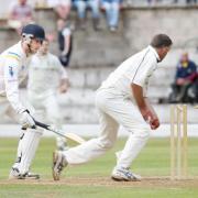 Lowerhouse’s Matt Walker is run out as Rawtenstall bowler Andrew Payne catches from the field and runs him out