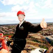 Martin James gives the thumbs-up during his charity abseiling stunt on The Big One