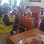 Young pupils from the Madrasah Zeenatul Quran visited a care home to speak to elderly residents where they handed blankets they had purchased out