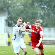 ON THE RUN: New boy John Ashworth on the attack for AFC Darwen against West Auckland