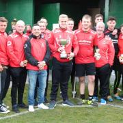 Colne Reserves celebrate winning the Galaxy Lancashire League title