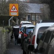 Cars parked outside Simonstone Primary School.
