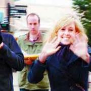 FLYING VISIT: X Factor finalist Diana Vickers waves to the crowds in King William Street, Blackburn