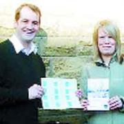 CREDIT CRUNCH: Jake Berry and shopper Hannah Gee with the Tories cards