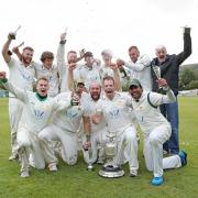 Walsden celebrate winning the Lancashire League title at the first attempt Pictures: KIPAX
