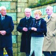 FAREWELLS: Ex-Claret player Jimmy McIlroy, second from left, and other mourners at Burnley Cermatorium for the funeral of former Turf Moor chairman John Jackson
