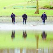 INVESTIGATION: Police search the Thompson Park lake