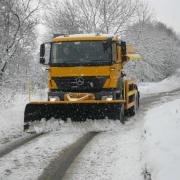 Gritter travelling in snow