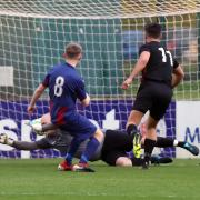Danny Taylor scores Crown Paints third goal against Eleven Sports Media in the LFA Sunday Trophy final
