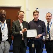Sean Greenwood was awarded employee of the month after he tackled a major flood at Clitheroe Community Hospital. Director of service improvement, Martin Hodgson presents Sean with his East Lancs 'employee of the month' certificate, with
